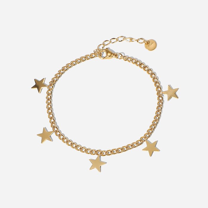 Bracelet géométrique en chaîne cubaine avec pendentif étoile à cinq branches dorées