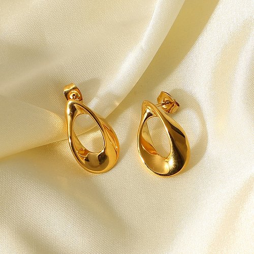fashion simple 18K goldplated stainless steel hollow buttonshaped stud earrings