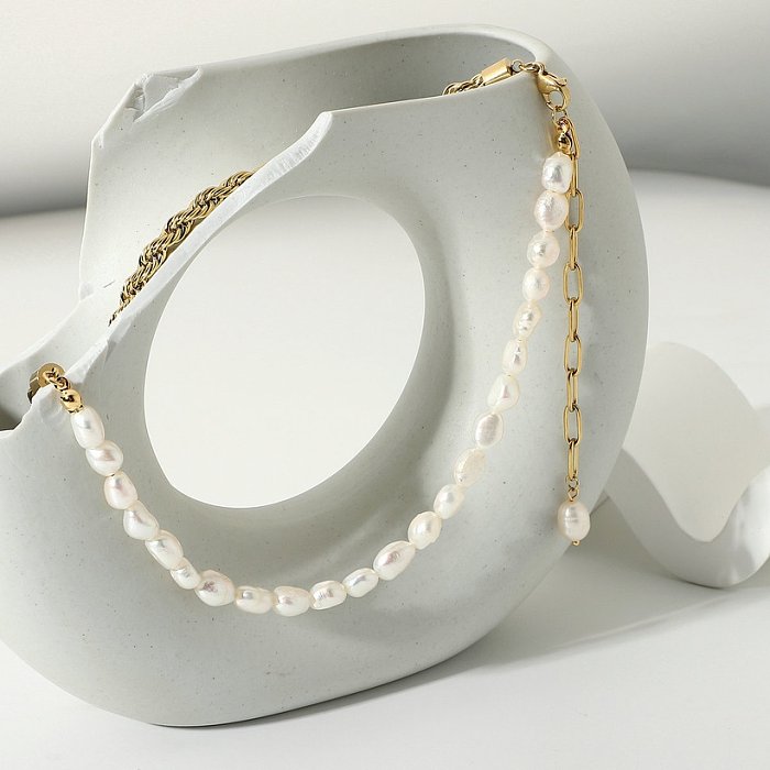 Collar de oro de 14 quilates con empalme de cadena torcida de perlas naturales de agua dulce