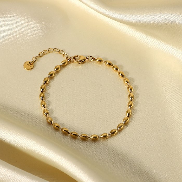 Nueva moda, joyería de cuentas ovaladas simples, pulsera de acero inoxidable chapada en oro de 14 quilates