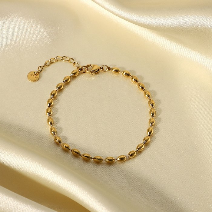 Nouveau bracelet en acier inoxydable plaqué or 14 carats avec perles ovales simples
