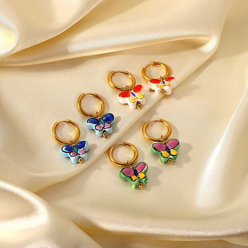 Boucles d'oreilles pendantes en céramique papillon fleur en acier inoxydable plaqué or 18 carats