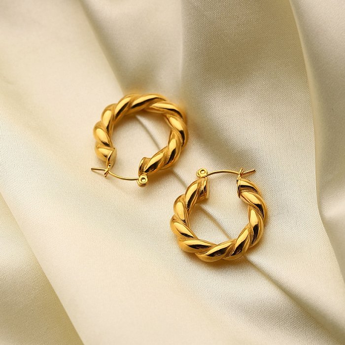 الكلاسيكية خاتم الفولاذ المقاوم للصدأ مطلي بالذهب والأقراط الملتوية