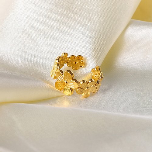 Gleicher Stil wie europäische und amerikanische Web-Prominente im Stil Blumen-offener Ring Titan-Stahl-Metall-Mode-Ring 18 Karat Edelstahl-Goldring