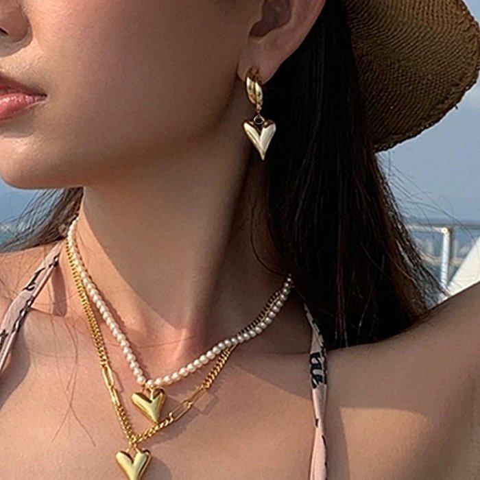 Nueva moda 14K chapado en oro de acero inoxidable corazón colgante pendientes joyería para mujer