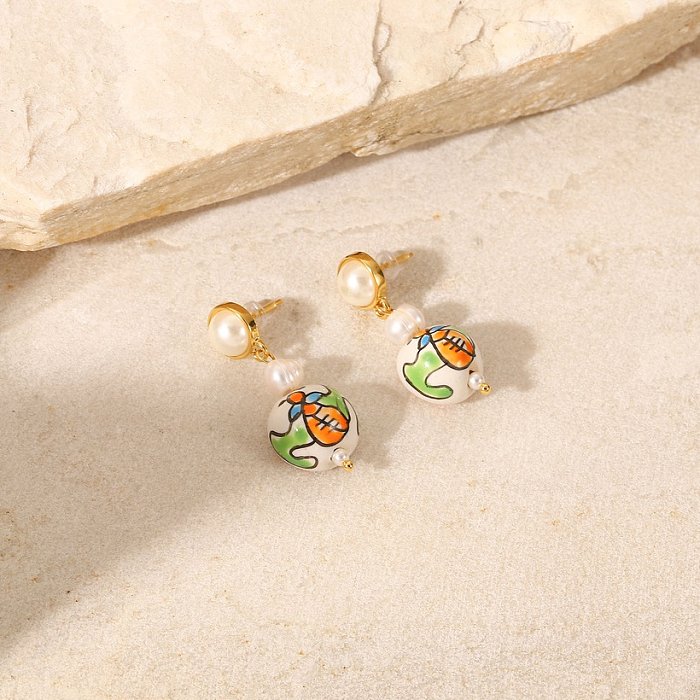Geometrische 18 Karat vergoldete perlenbemalte Keramik-Anhänger-Edelstahl-Ohrringe im neuen Stil