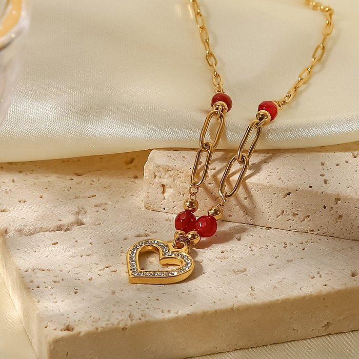Art- und Weiseherzform-Edelstahl-hängende Halsketten-vergoldete Inlay-künstliche Diamant-Edelstahl-Halsketten