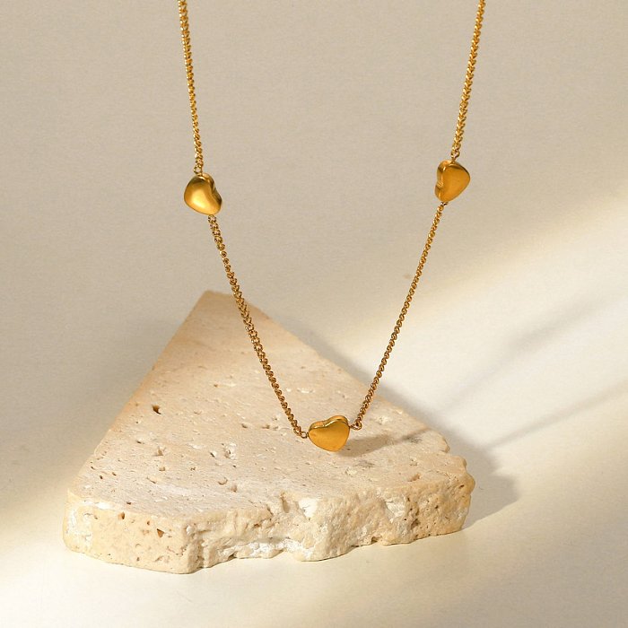 Moda nuevo adorno de collar en forma de corazón de acero inoxidable de oro de 18 quilates
