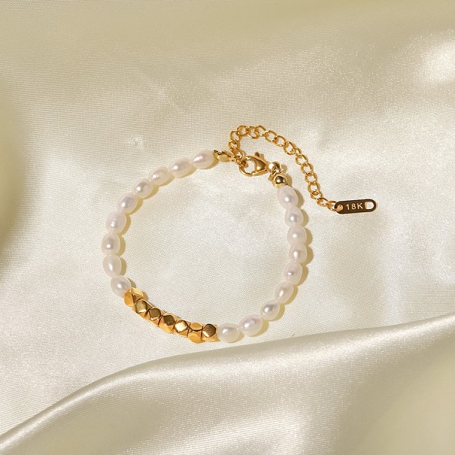 Elegante geometrische Edelstahl-Armbänder Vergoldete Perlen-Edelstahl-Armbänder