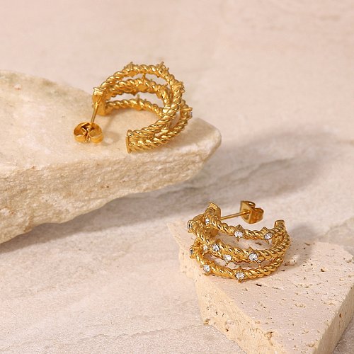 Boucles d'oreilles en placage creux en acier inoxydable en forme de Zircon d'or à la mode