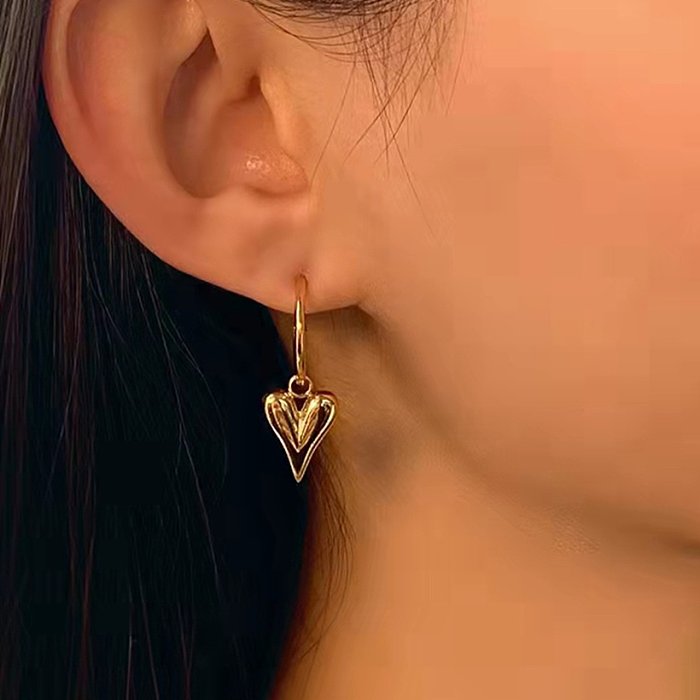 bijoux de boucles d'oreilles pendantes en forme de coeur minces simples en acier inoxydable