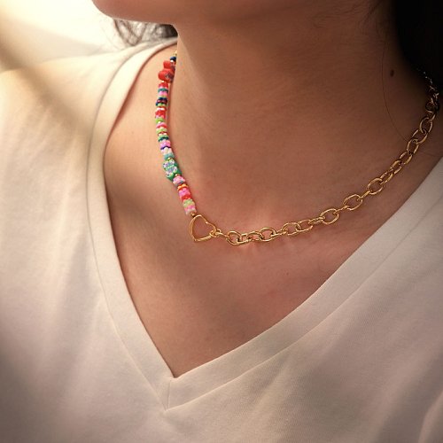 Novo estilo pingente de coração oco 18k banhado a ouro aço inoxidável cor cerâmica costura colar de corrente cruzada