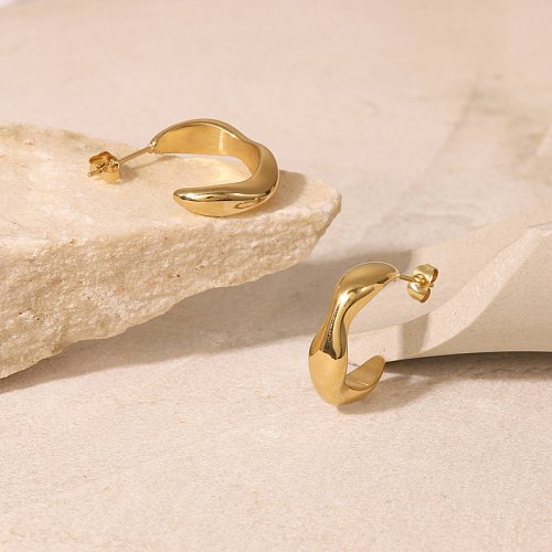 Pendientes en forma de C irregulares de acero inoxidable chapados en oro de 14 quilates simples de moda