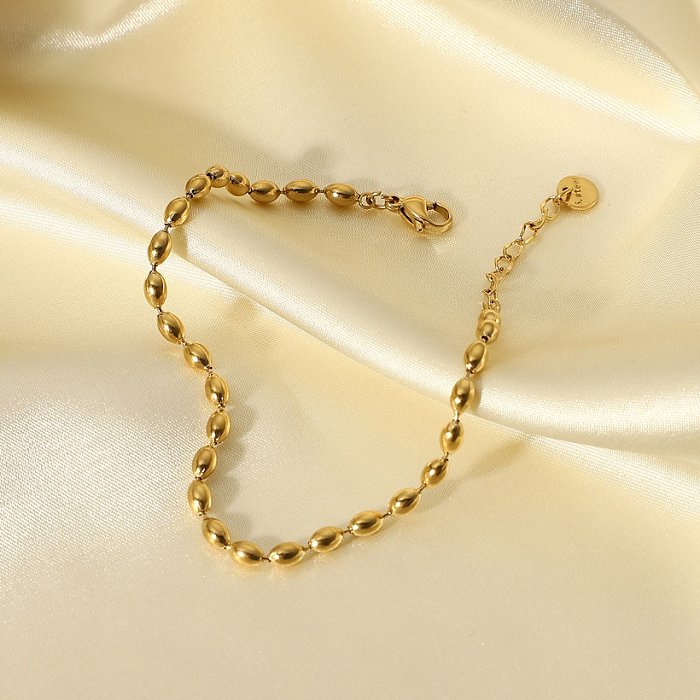 Nouveau bracelet en acier inoxydable plaqué or 14 carats avec perles ovales simples
