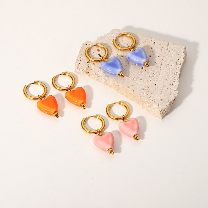 Boucles d'oreilles pendantes en forme de cœur en céramique en acier inoxydable plaqué or 18 carats