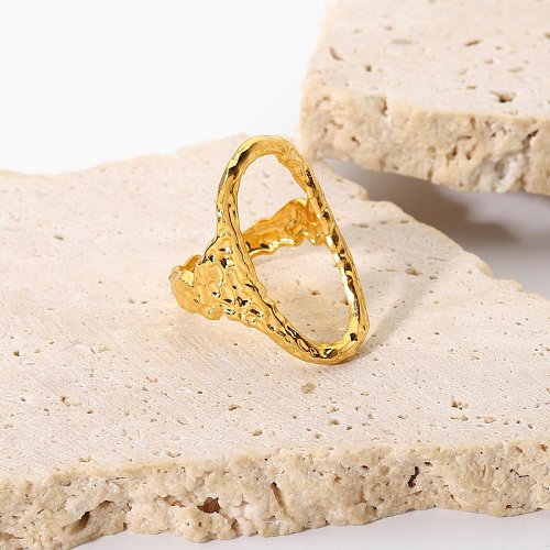 Europäischer und amerikanischer Internet-heißer neuer Ring 18K Edelstahl-Frauen-Ring-hohler ovaler gehämmerter offener Ring für Frauen-Paar-Ringe