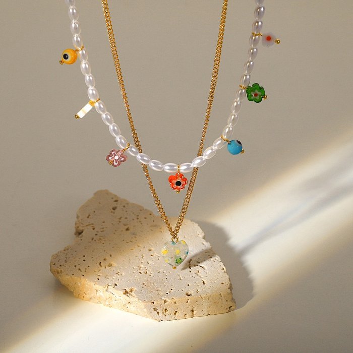 Neuer Stil 18 Karat vergoldeter Edelstahl Farbige Glasur-Blumen-Perlen-Doppelschicht-Anhänger-Halskette