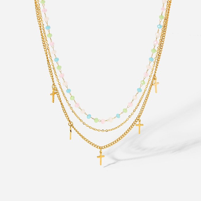 Mode farbige Perle Titan Stahl Kette Kreuz Quaste Anhänger dreischichtige 18 Karat vergoldete Edelstahl-Halskette