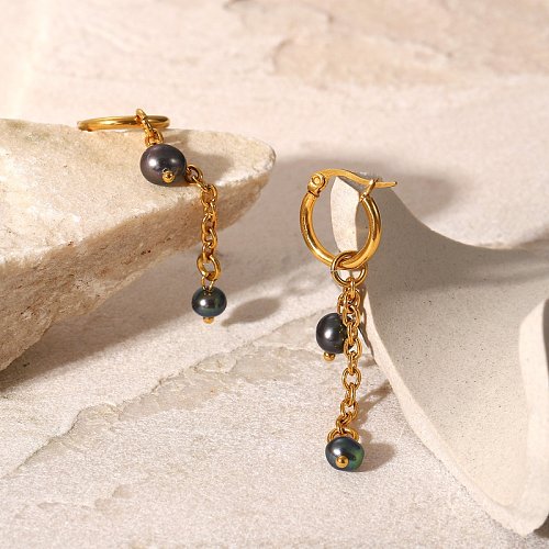 Boucles d'oreilles pendantes à pompon en forme de perle noire vintage en acier inoxydable