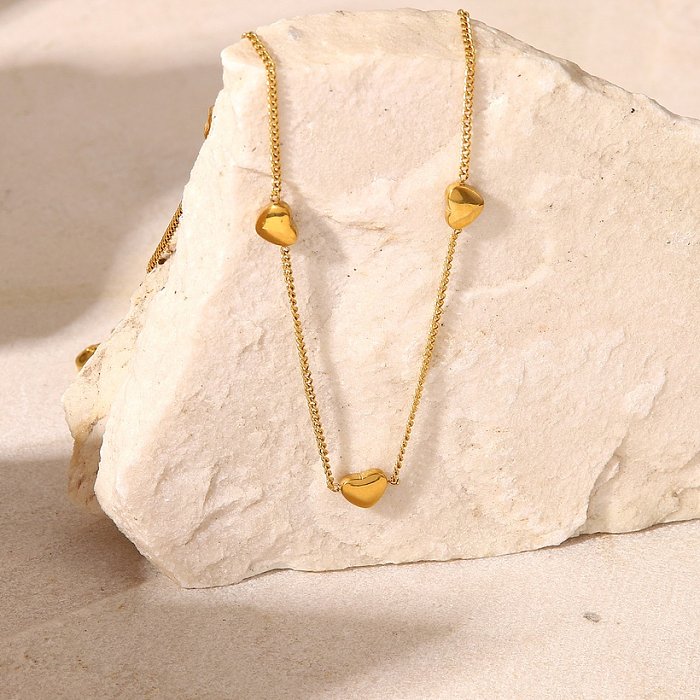 Ornement de collier en forme de coeur en acier inoxydable en or 18 carats