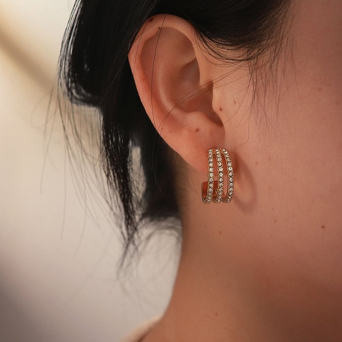Boucles d'oreilles linéaires à trois couches en zirconium blanc à la mode en or 18 carats