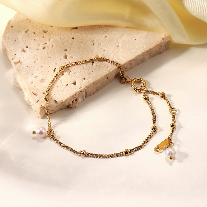 Bracelet chaîne fine en acier inoxydable neuf plaqué or avec deux perles de millet