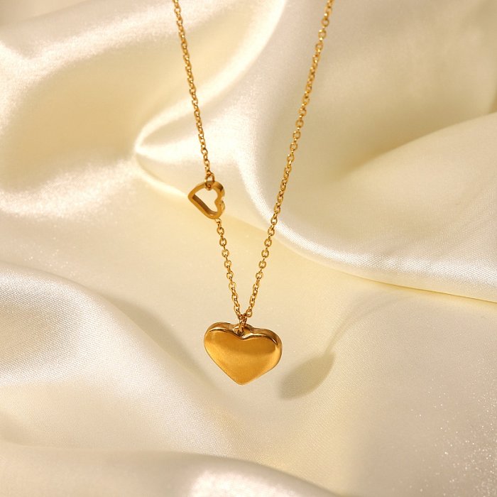 Collier pendentif double cœur en acier inoxydable plaqué or 18 carats