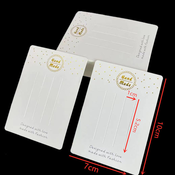 Tarjeta de clip de bronceado blanco de 100 Uds., tarjeta de papel DIY, versión coreana, tarjeta de embalaje de joyería, bolsa de embalaje de papel, tarjeta para sombreros, venta al por mayor