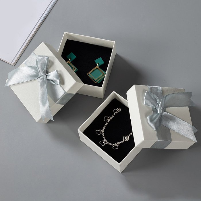 Caixa de embalagem de presente de joias de arco de cor sólida fashion de uma peça