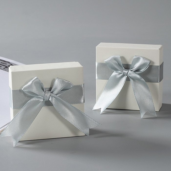 Caja de embalaje de regalo de joyería de arco de color sólido de moda de una pieza