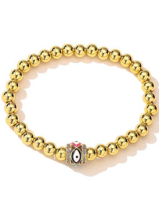 Bracelet perlé vintage en laiton et zircon cubique Evil Eye