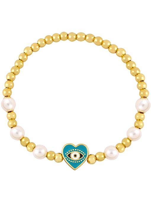 Bracelet de perles vintage en laiton imitation perle émail mauvais œil