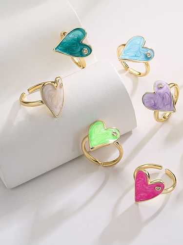 Anillo de banda minimalista con corazón de esmalte de latón