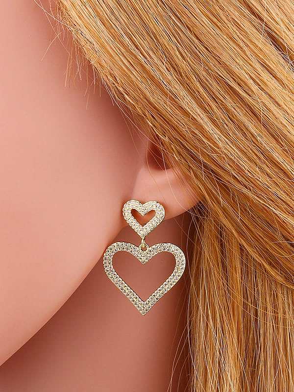 Boucles d'oreilles pendantes vintage en laiton et zircon cubique