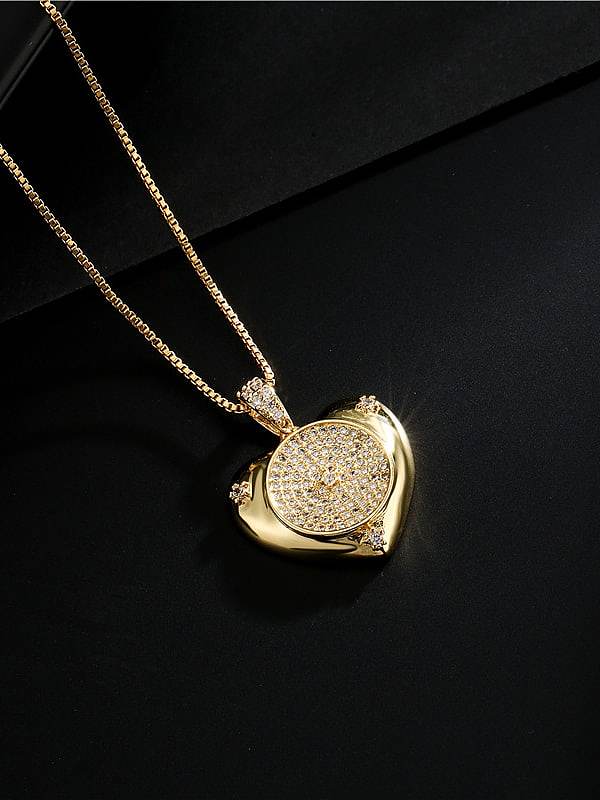 Collier pendentif coeur vintage en laiton et zircon cubique