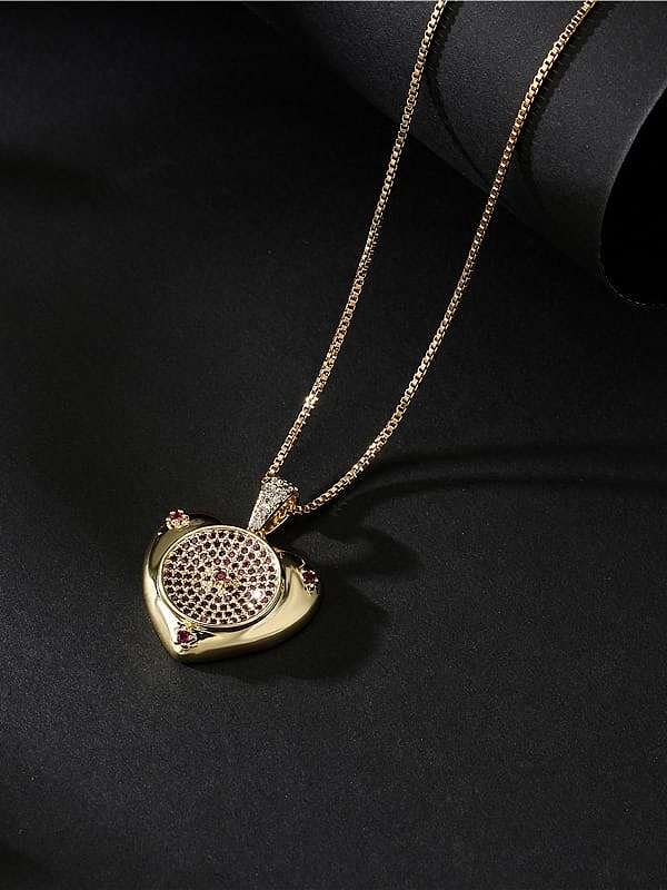 Collier pendentif coeur vintage en laiton et zircon cubique