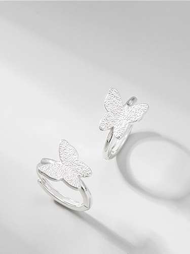 Pendiente lindo Huggie de mariposa de plata esterlina 925