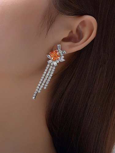 Boucle d'oreille de luxe en argent sterling 925 avec diamant à haute teneur en carbone et pompon orange
