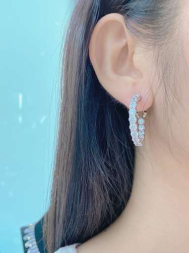 Boucles d'oreilles créoles délicates en forme de fleur de diamant à haute teneur en carbone en argent sterling 925