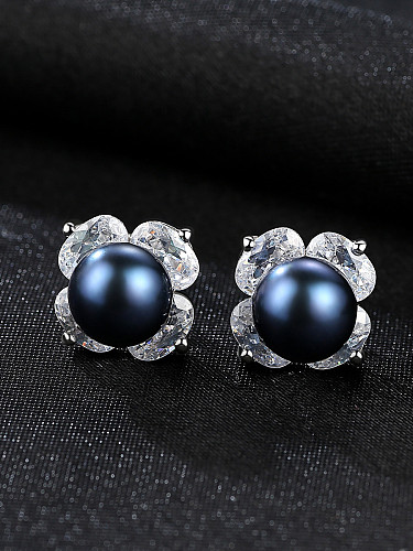 Aretes de perlas negras con flor de circón 3A de plata esterlina