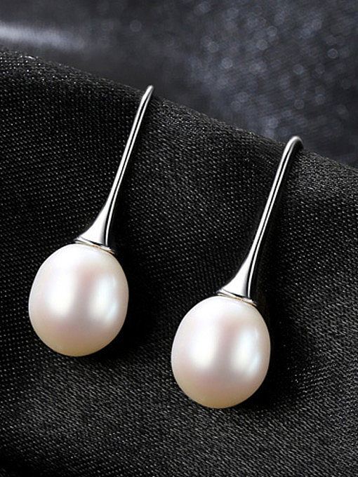 Boucles d'oreilles minimalistes en perles d'eau douce naturelles en argent sterling