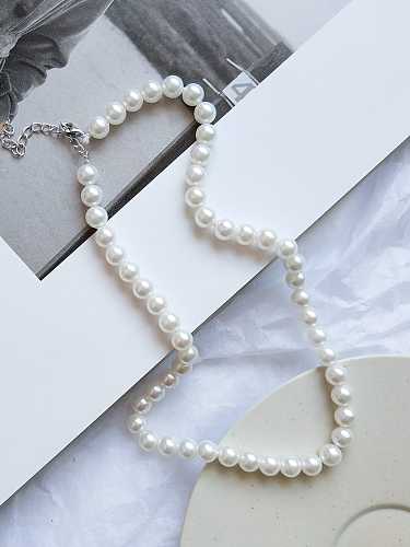 Collar de plata de ley 925 con perla de imitación blanca.