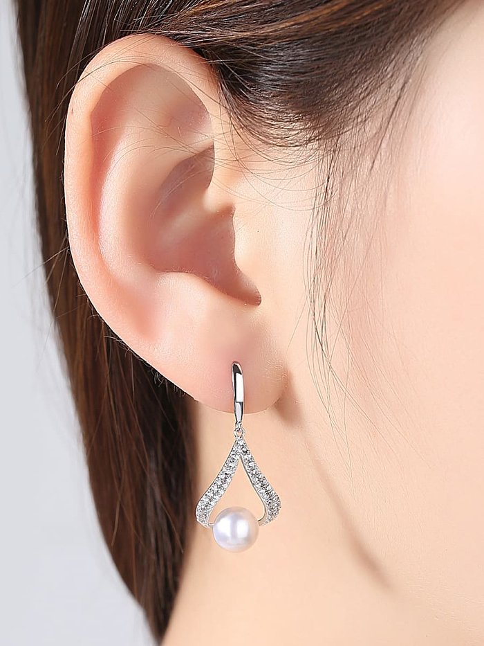Boucles d'oreilles goutte tendance géométrique blanche perle d'eau douce en argent sterling 925