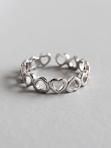 925 Sterling Silver With Platinum Plated Simplistic hollow Heart Free Size Rings