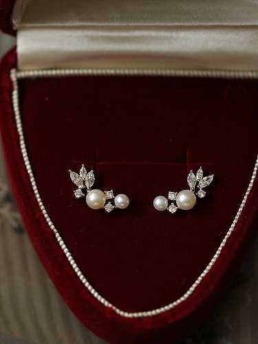 Boucles d'oreilles en argent sterling 925 avec perle d'imitation et aile délicate