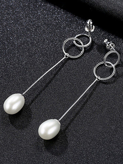 Boucles d'oreilles en perles naturelles à double anneau en argent pur