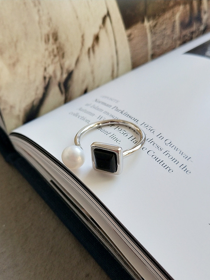 Sterling silver synthetic pearl black agate ring