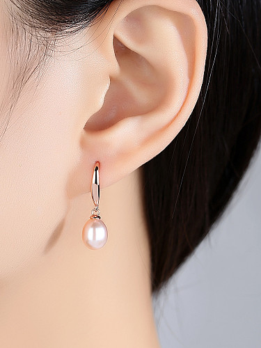Boucles d'oreilles classiques en perles d'eau douce naturelles en argent sterling