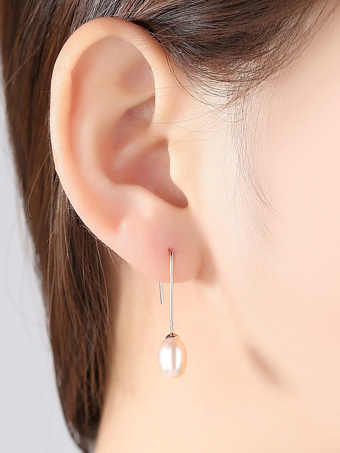 Gancho para la oreja simple versátil de plata de ley con perla natural