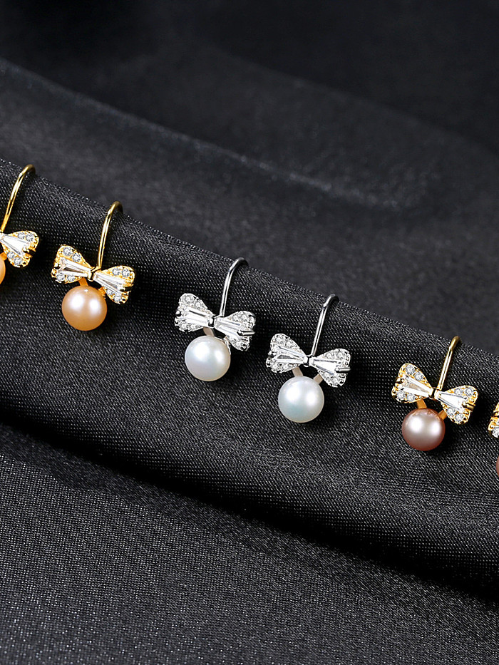 Pure silver natural freshwater pearl cute bow tie studs